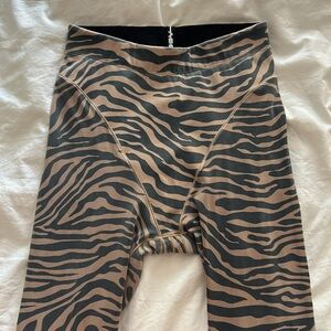 Adam Selman Sport ASS size S French Cut Legging tiger striped sand and black
